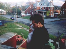 Debi in photo taken on front porch in Rumford